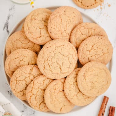 cinnamon brown butter cardamom cookies on a circle plate