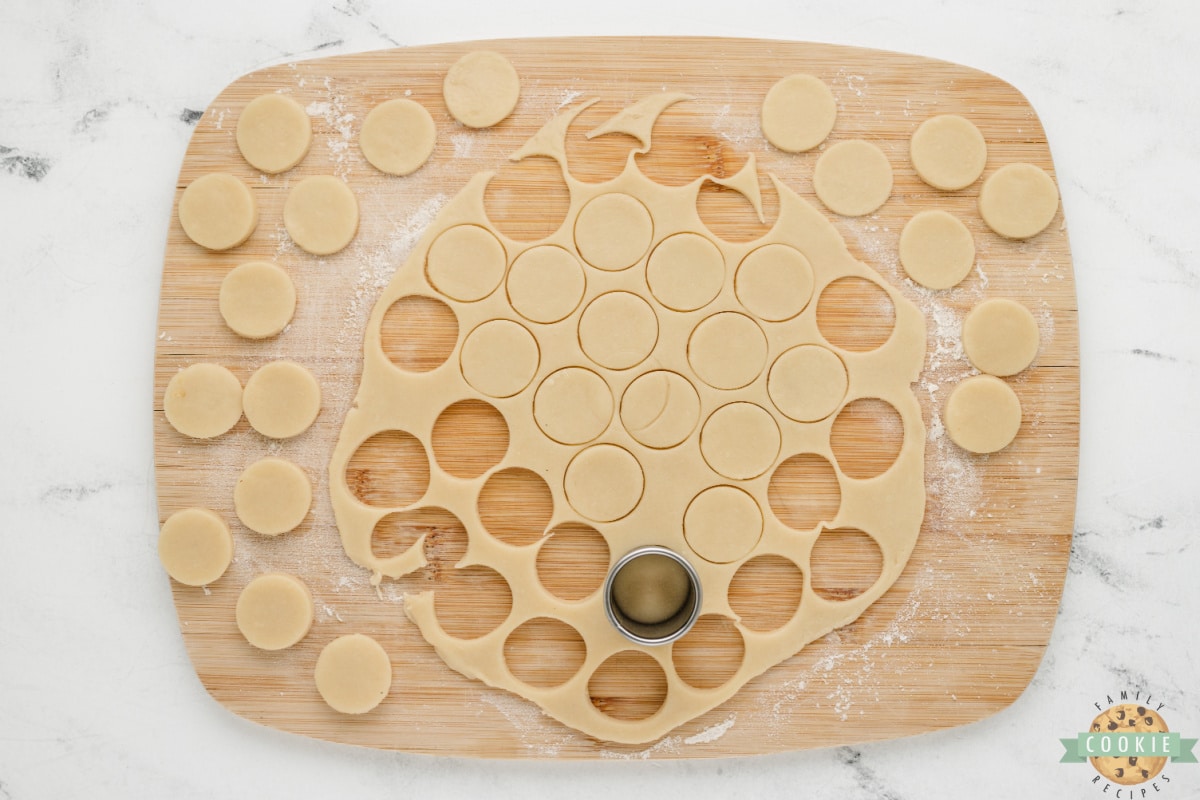 Cookie dough cut into small circles. 