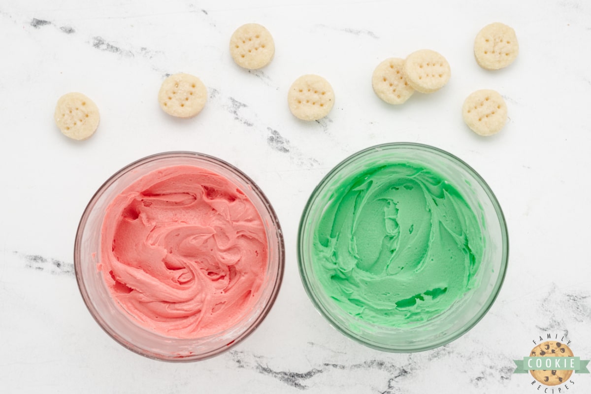 Add food coloring to the frosting. 