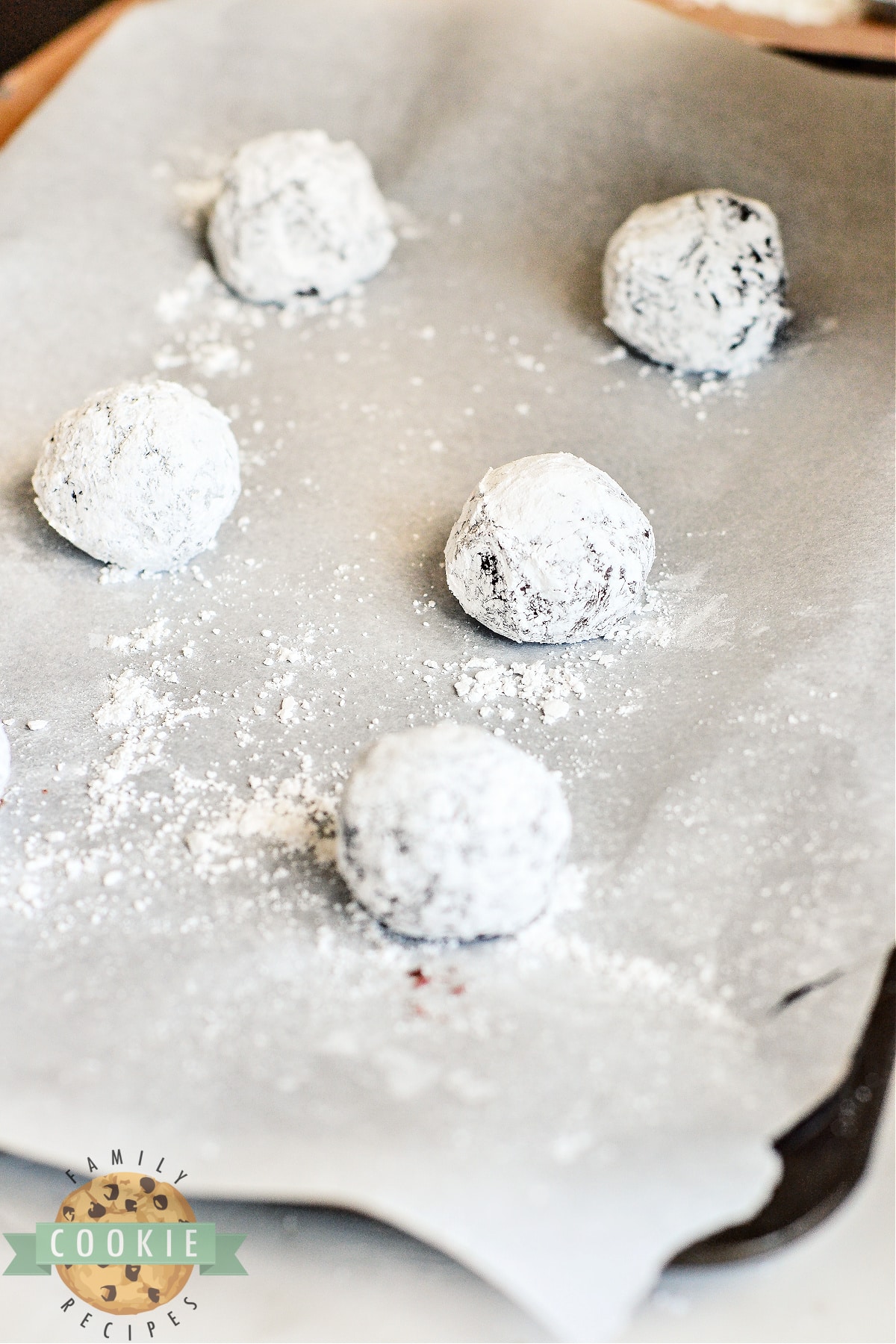 Place coated cookie dough balls on baking sheet. 