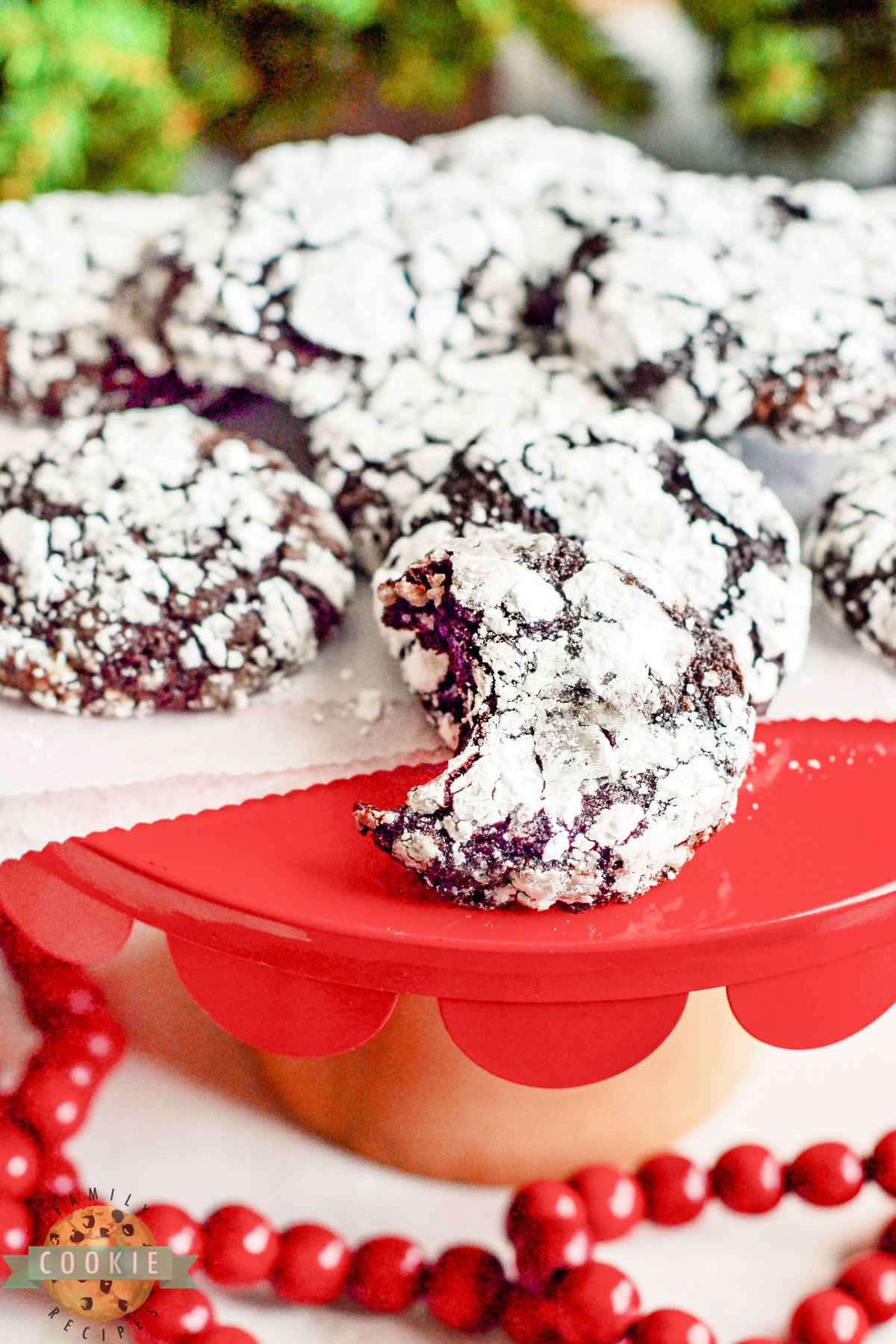 Raspberry Chocolate Crinkle Cookies are soft, chewy, and full of flavor. Adding raspberry preserves gives this classic chocolate crinkle cookie recipe a delicious twist! 