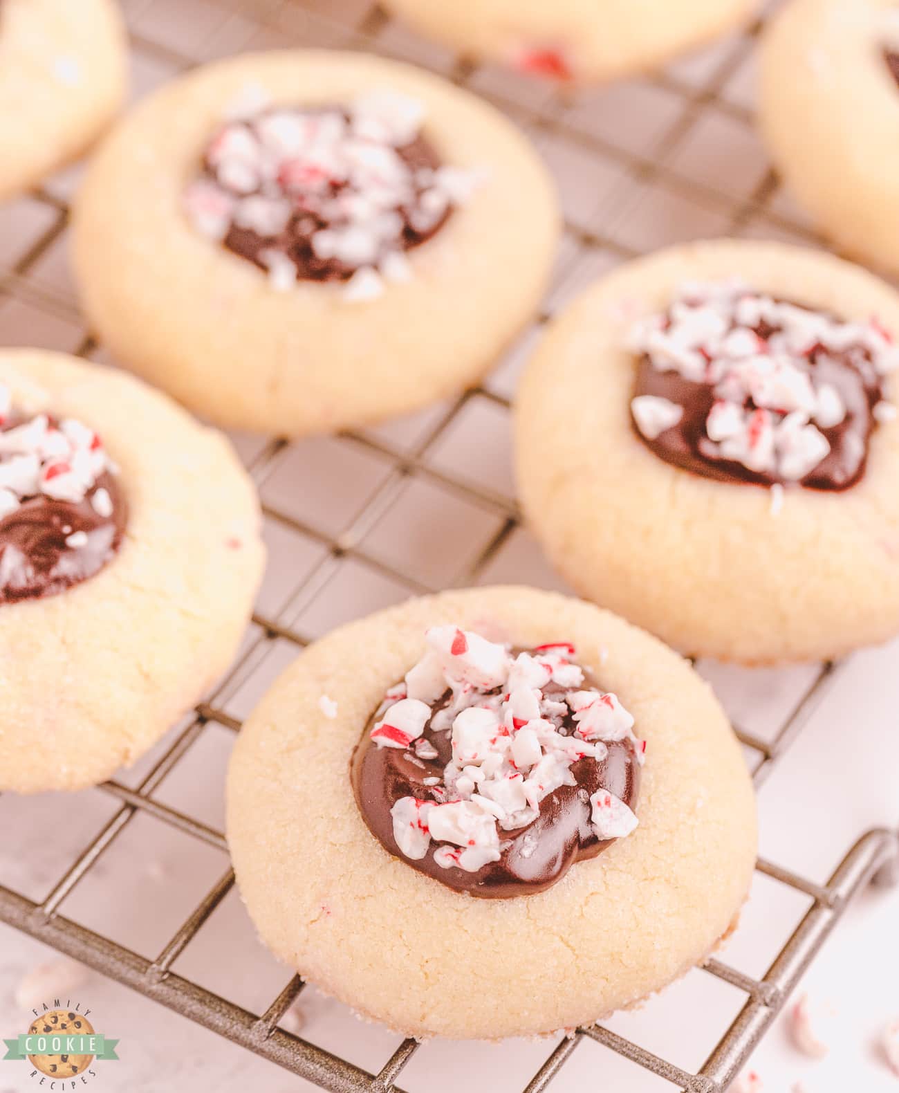 peppermint chocolate thumbprints on a cooling rack