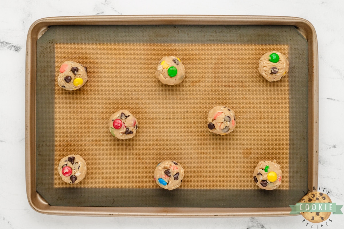 Scoop balls of dough onto cookie sheet.