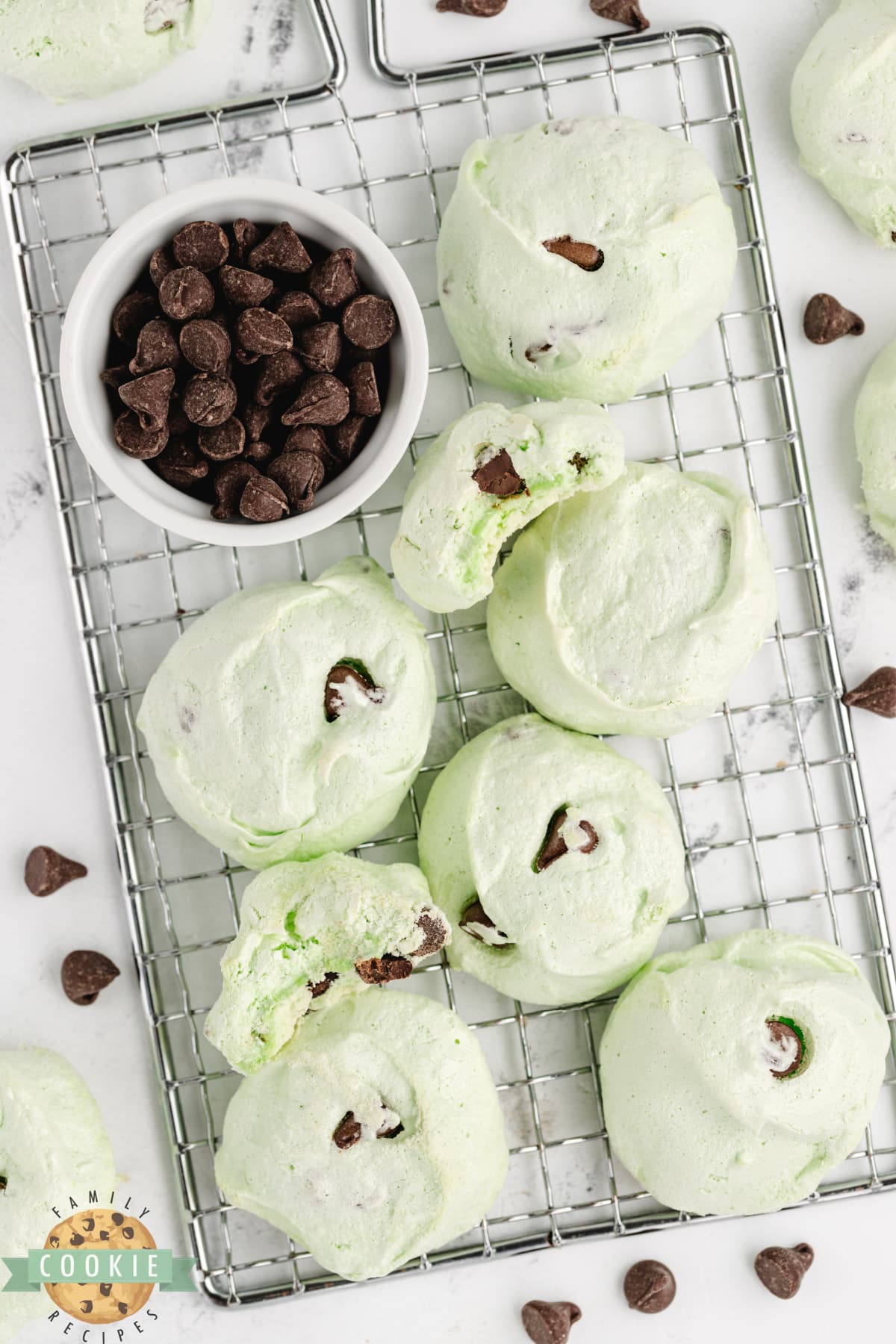 Mint Chocolate Chip Meringue Cookies cooling on a wire rack. 