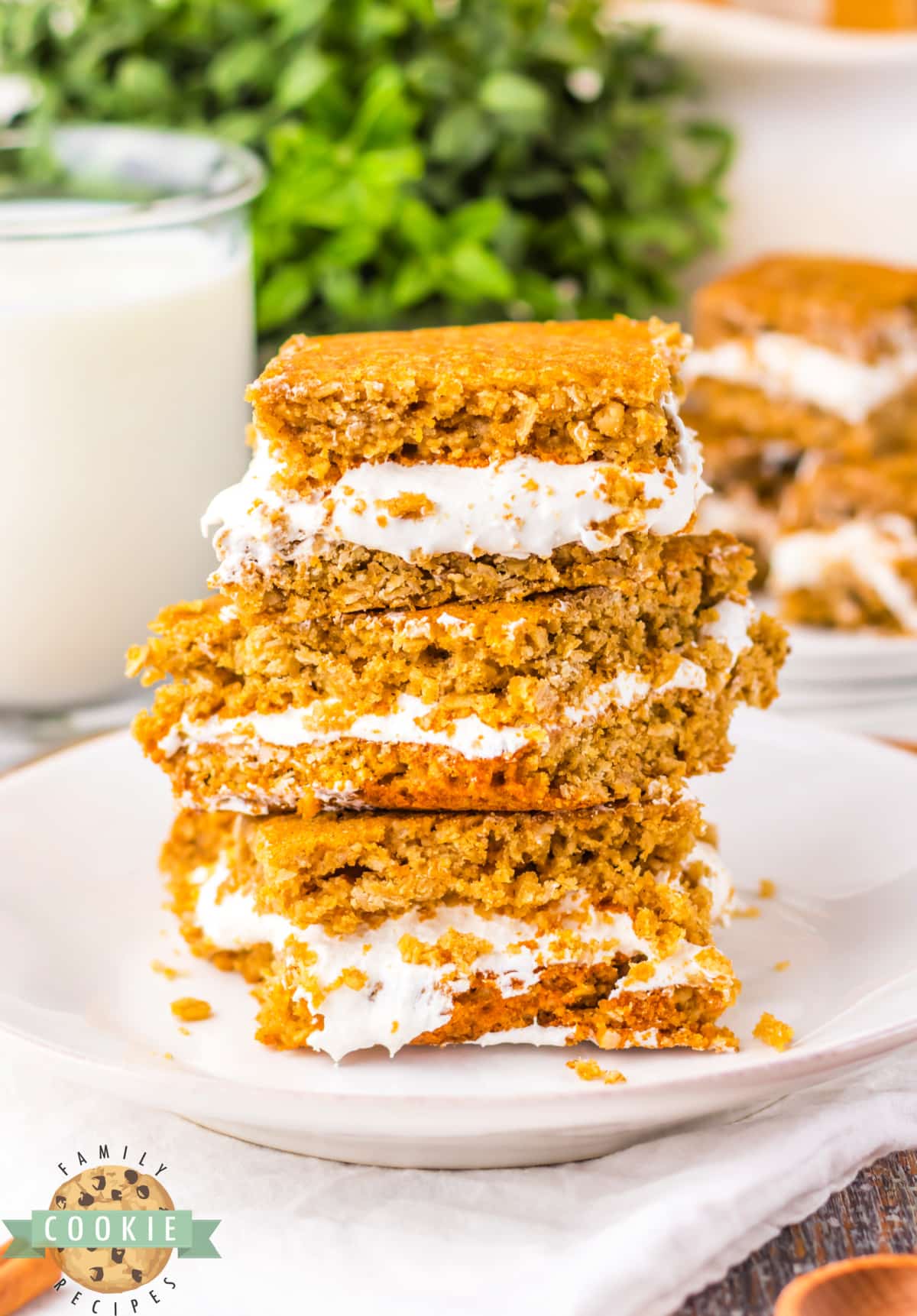 Oatmeal Cream Pie Bars taste just like Oatmeal Creme Pies with marshmallow cream filling sandwiched between two soft and chewy oatmeal cookie layers. Delicious sandwich cookie bars that are so easy to make!