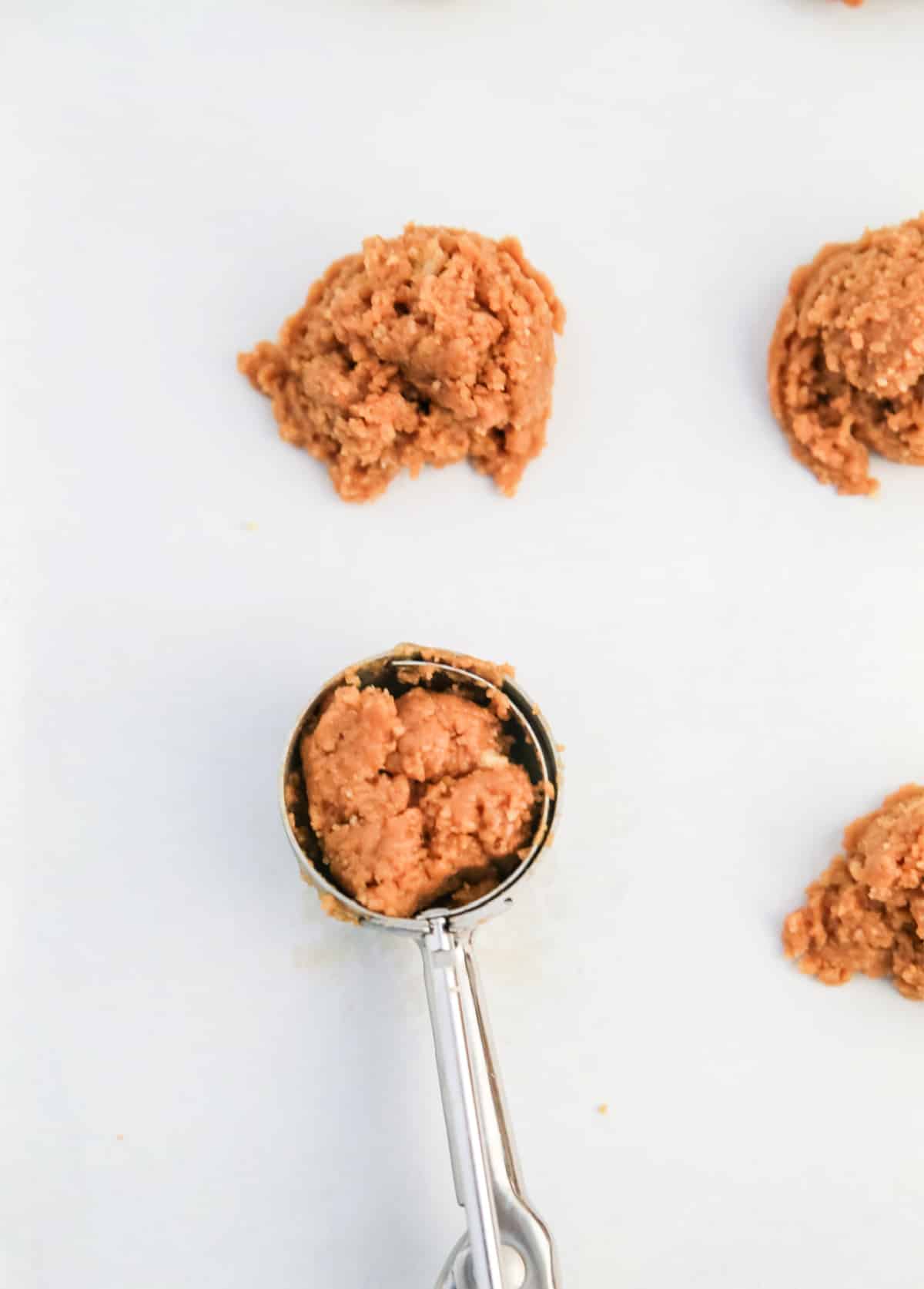 Scoop cookie butter mixture with cookie scoop. 