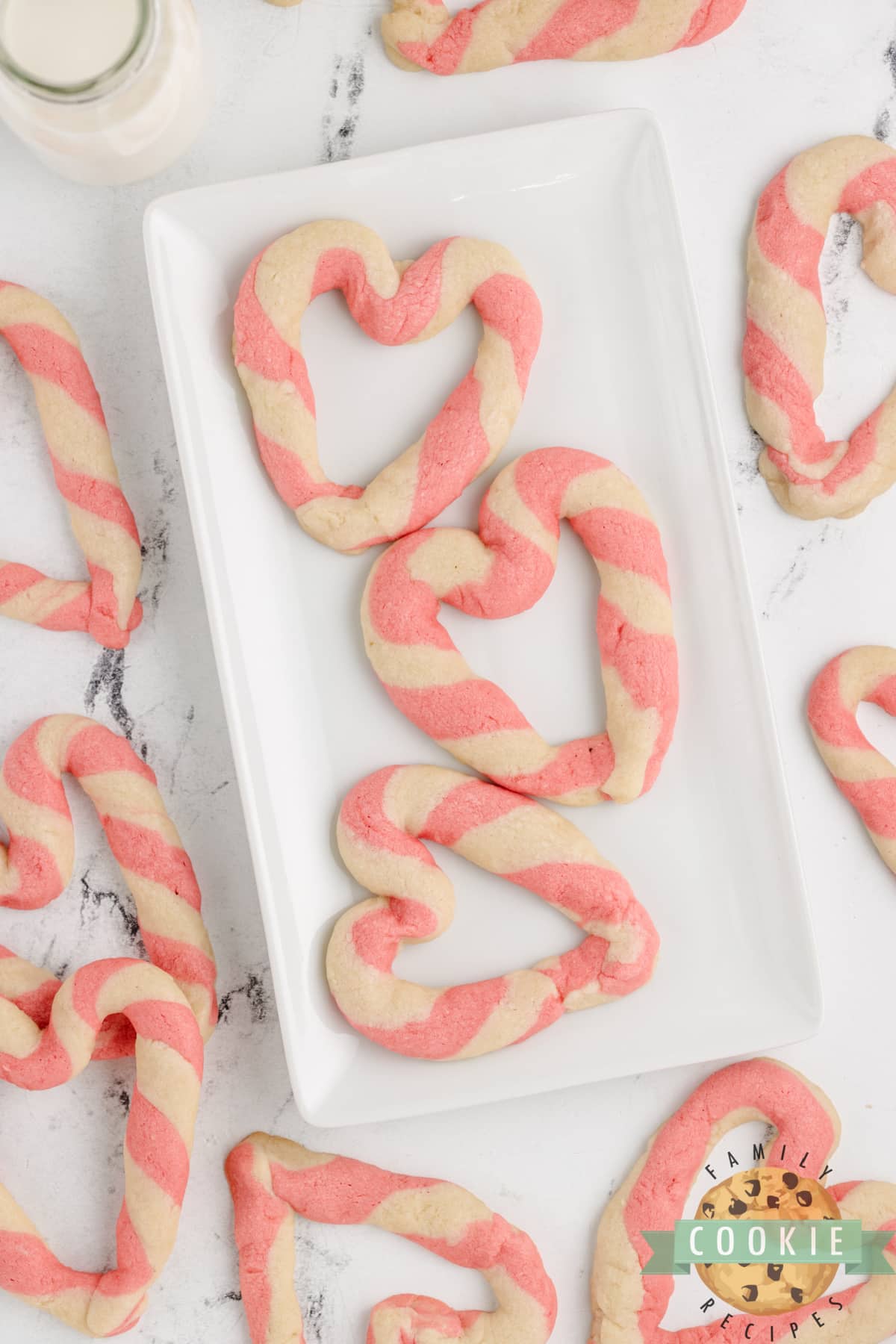 Pink and white striped heart cookies.