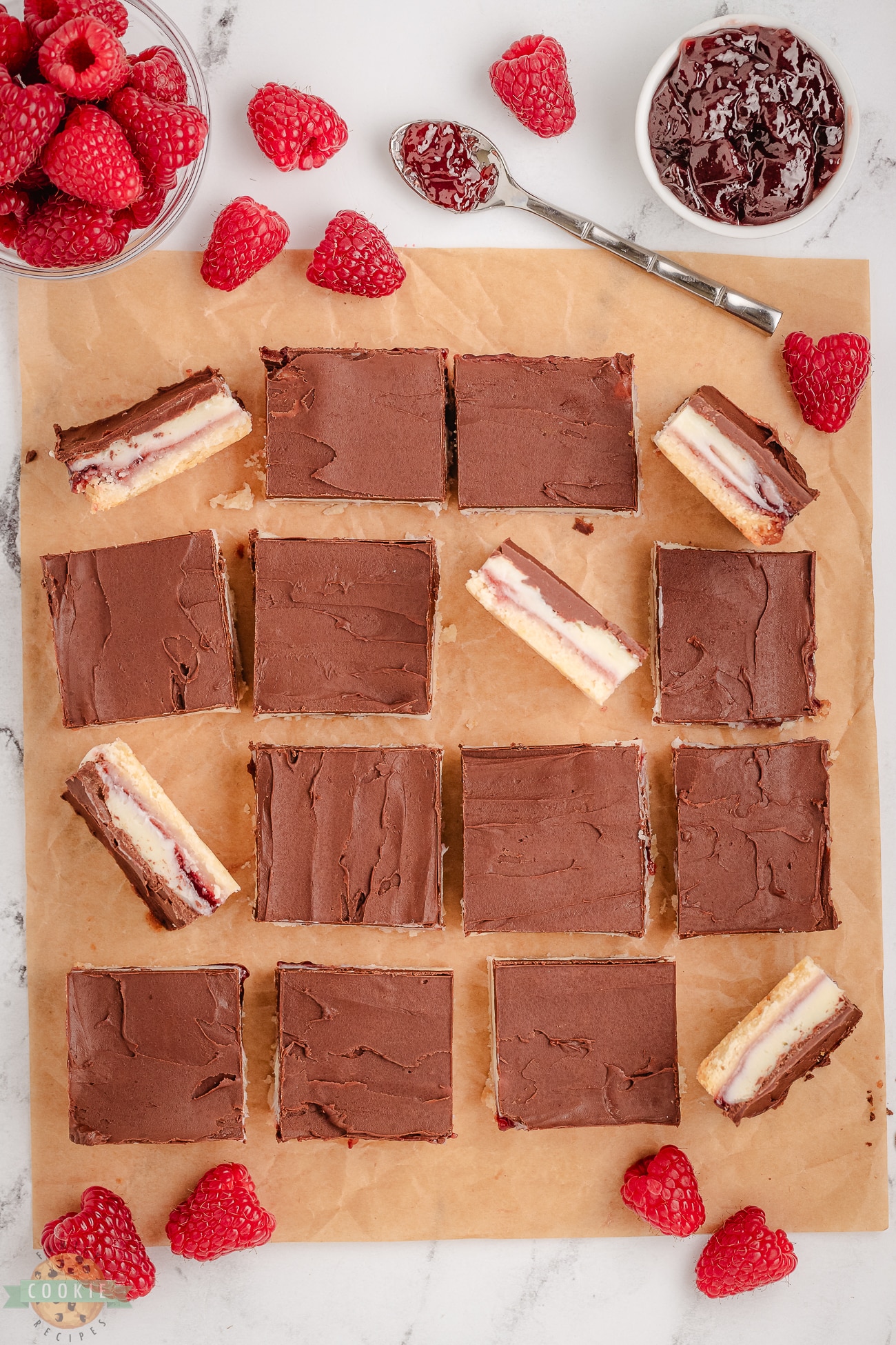 tray full of chocolate raspberry cookie bars