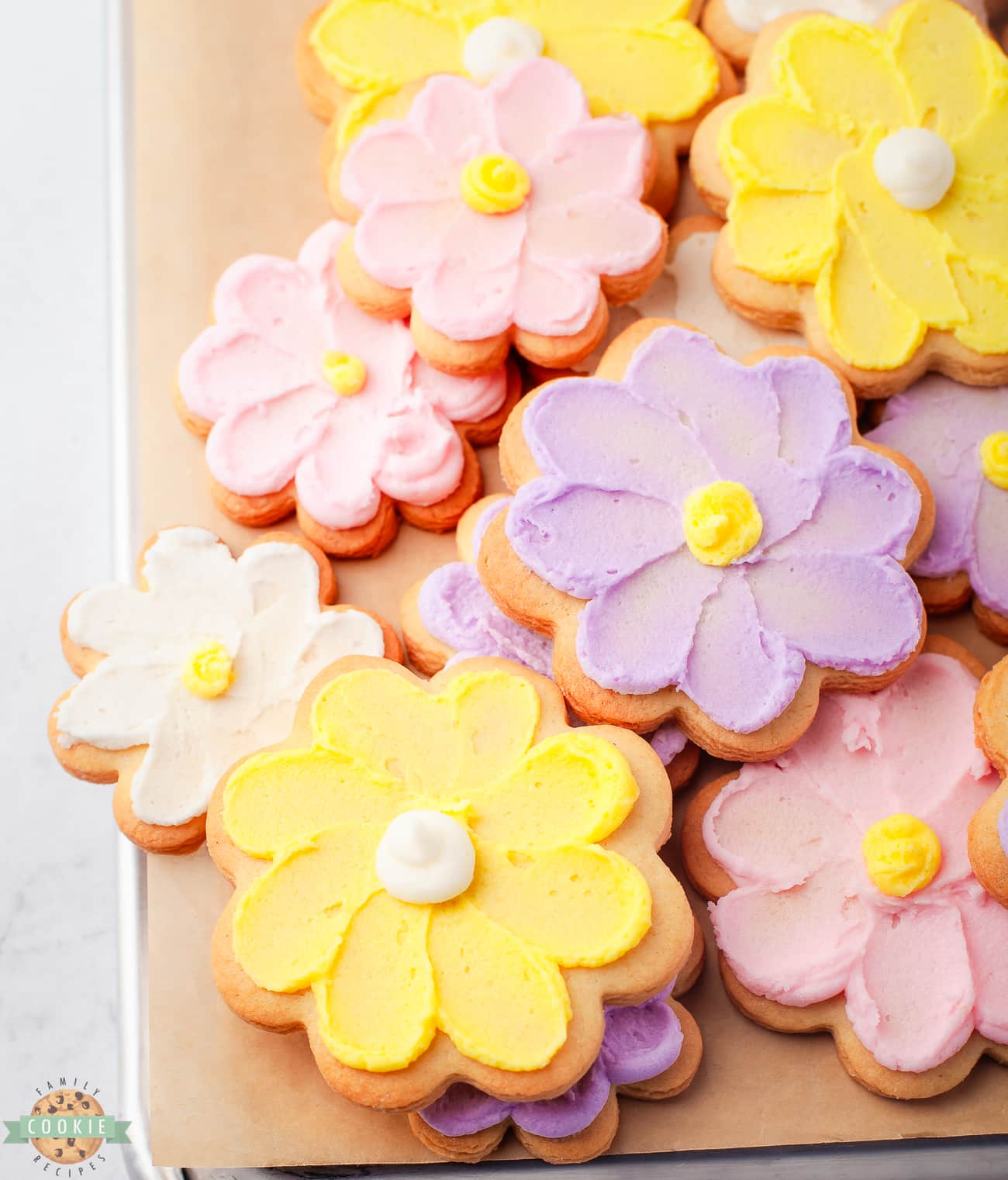 lovely Spring flower cookies piped with silky buttercream