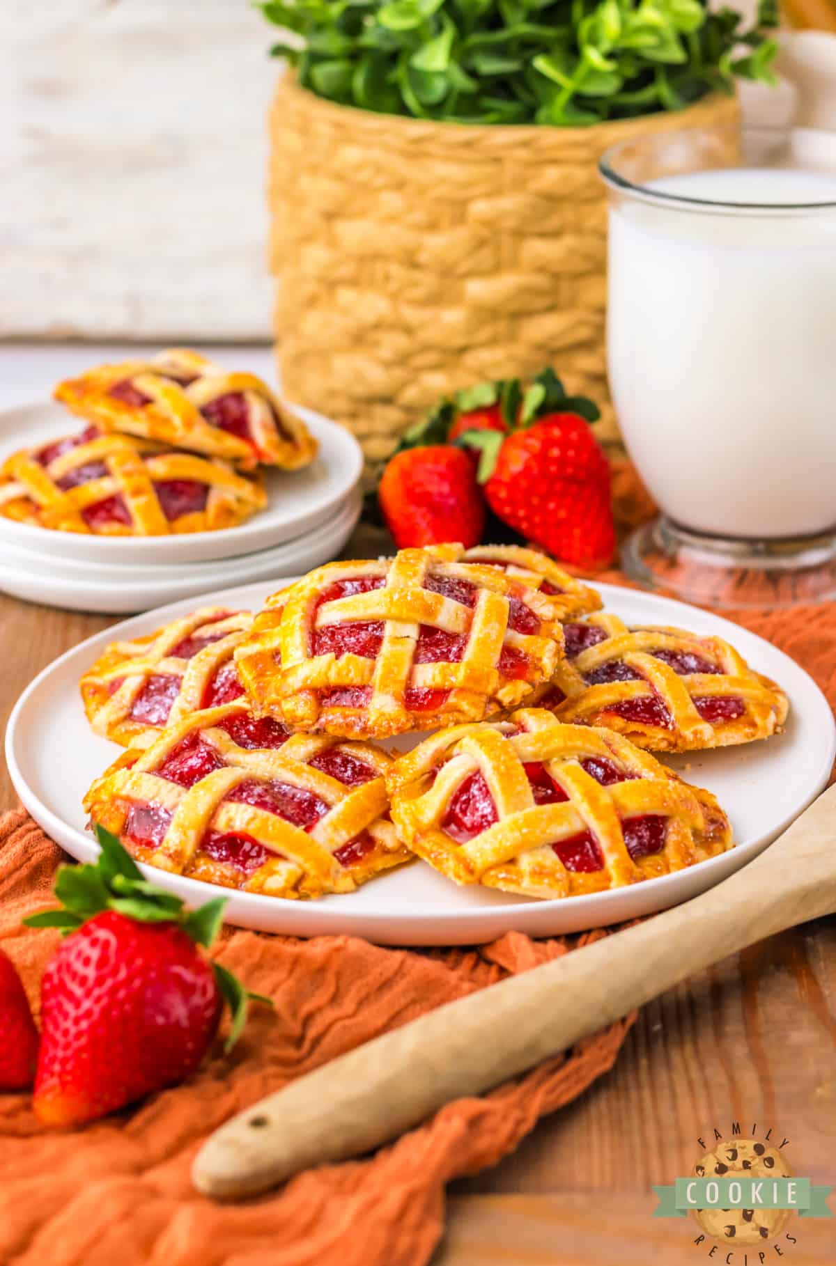 Plate of mini strawberry pies. 