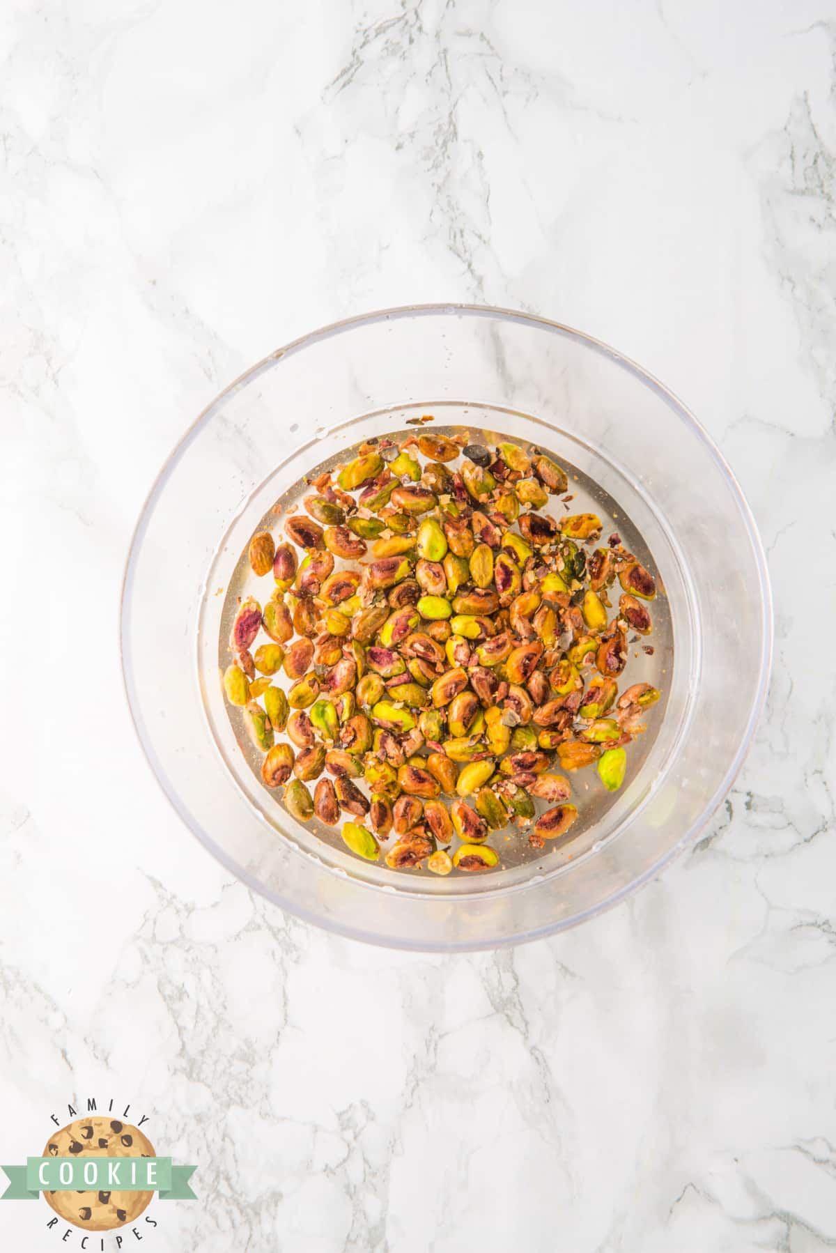 Soaking pistachios in water.