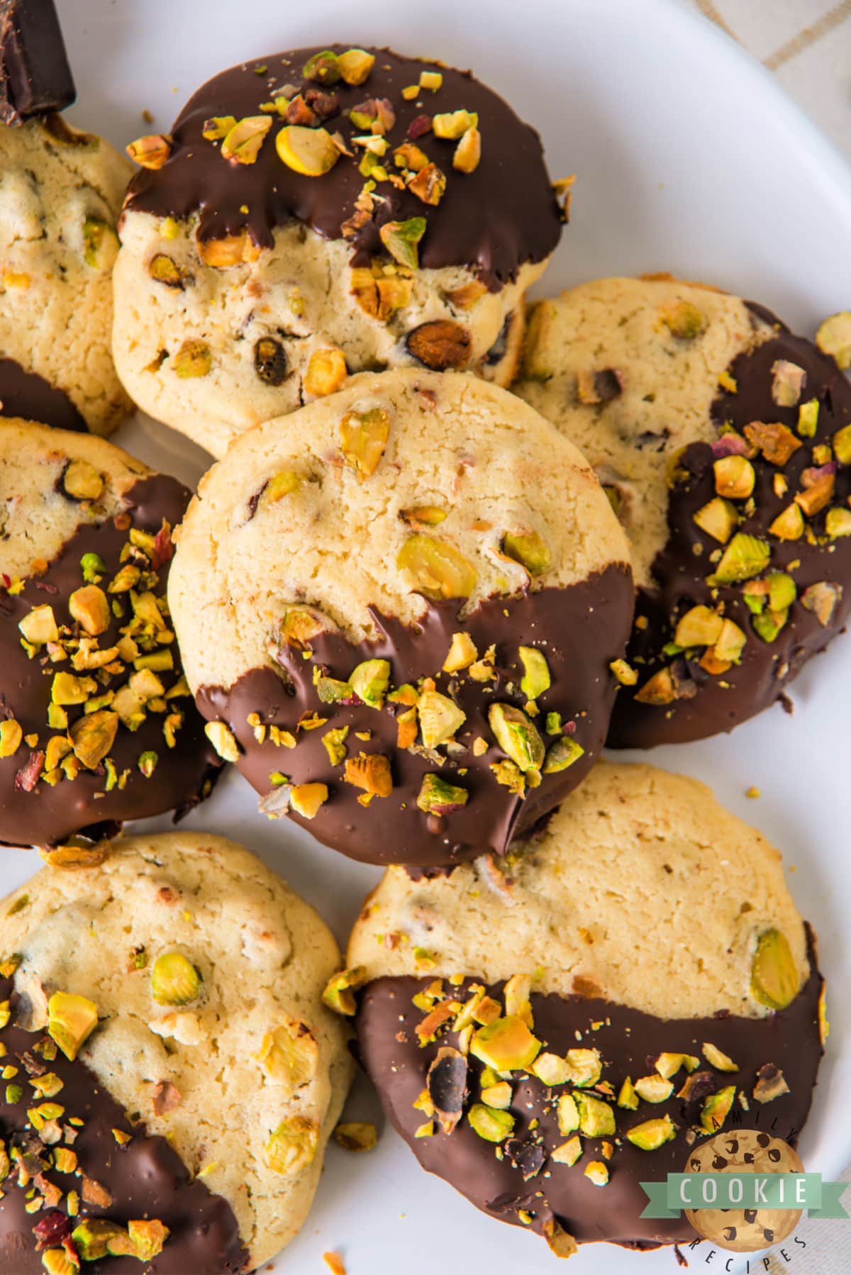 Chocolate Dipped Pistachio Cookies are soft and chewy pistachio cookies coated with dark chocolate. Freeze the dough and then slice and bake when ready to eat!