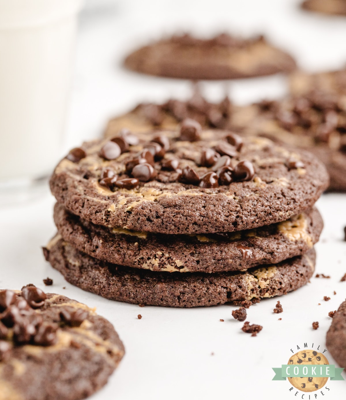 Chocolate Peanut Butter Swirl Cookies are soft, chewy, and delicious! These rich chocolate cookies have a swirl of peanut butter and a sprinkling of mini chocolate chips on top.