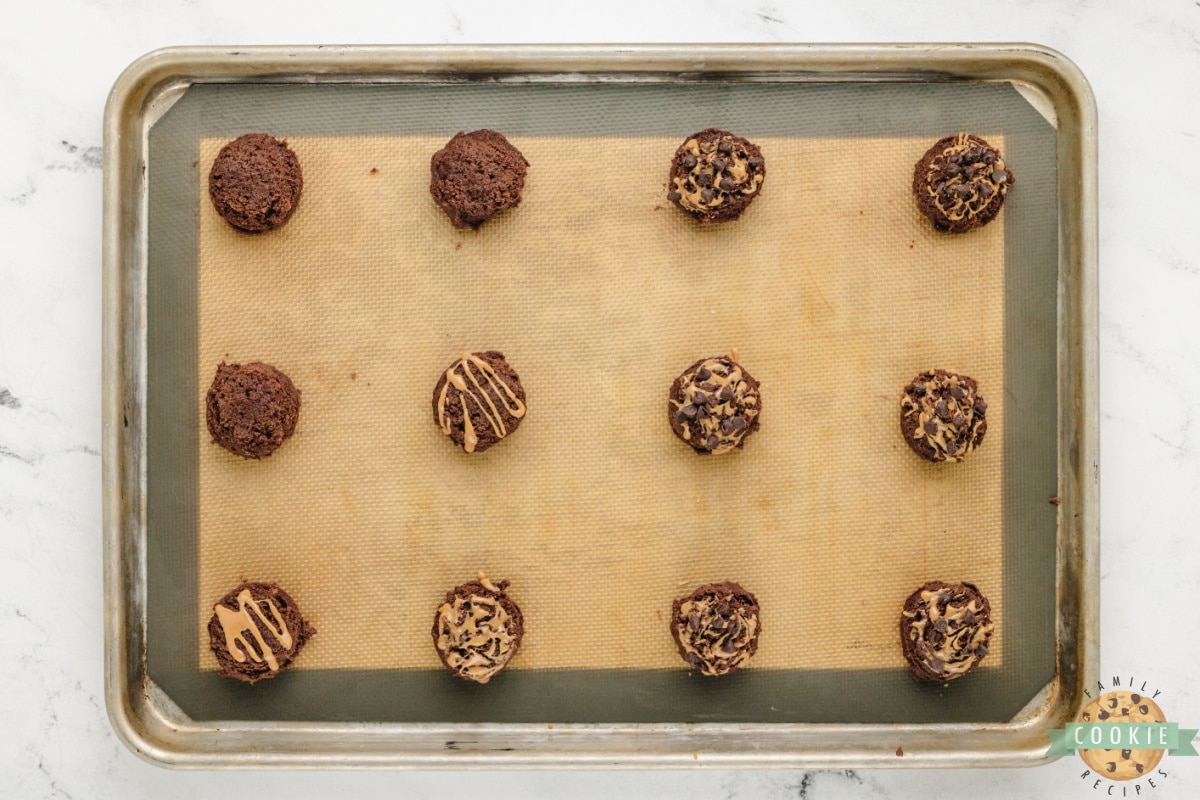 Cookie dough balls with peanut butter swirl and mini chocolate chips.