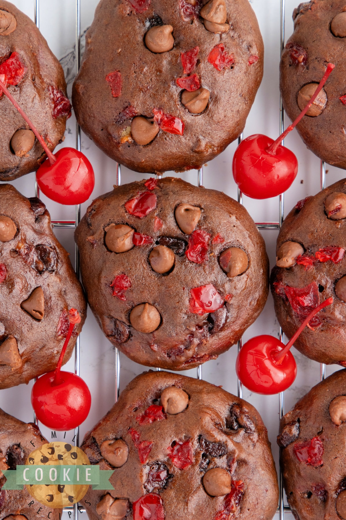 Double Chocolate Banana Split Cookies are made completely from scratch with bananas, chocolate chips, and maraschino cherries. These chewy chocolate cookies taste just like a banana split  - especially if you add a scoop of vanilla ice cream! 