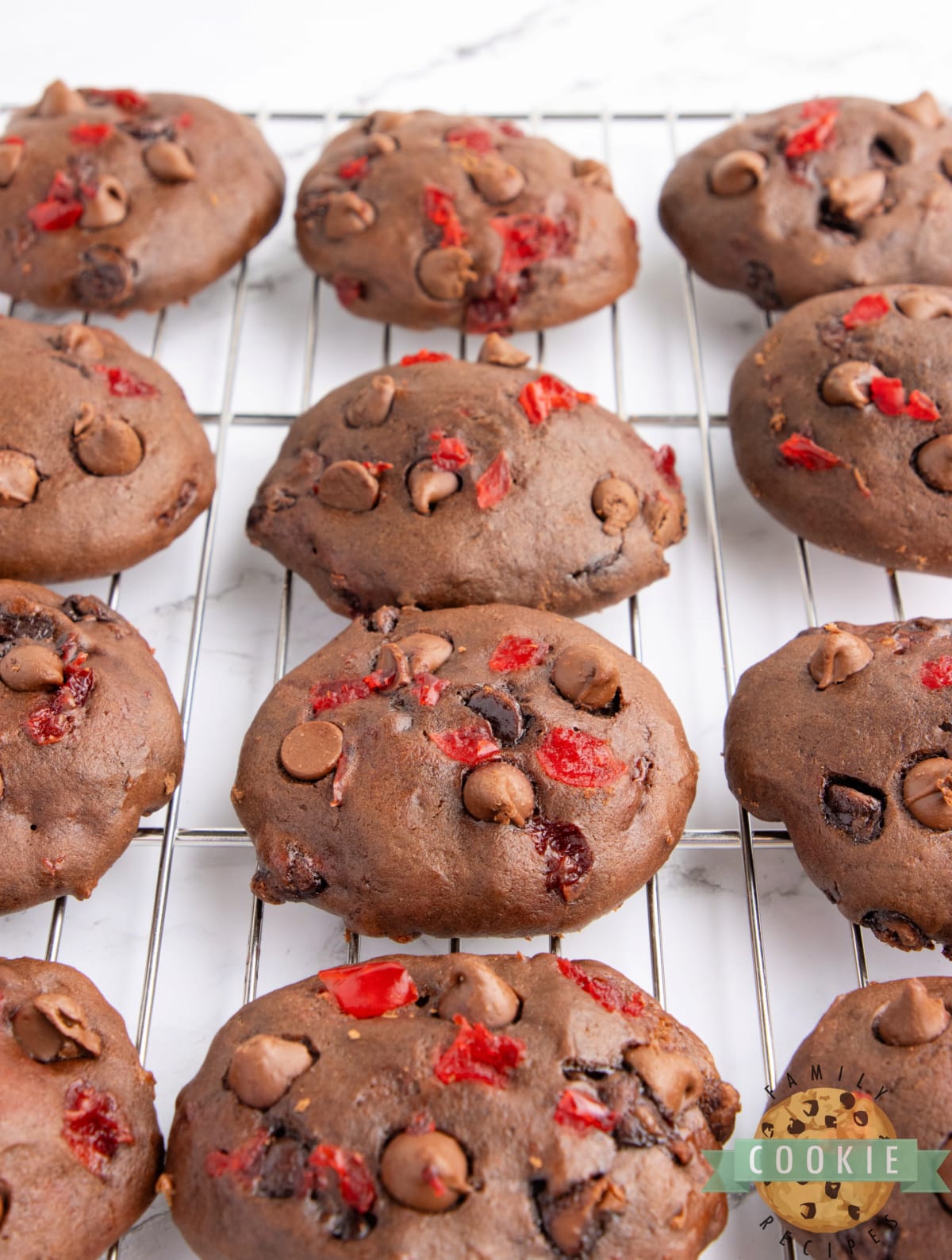 Double chocolate banana split cookies cooling on a wire rack. 