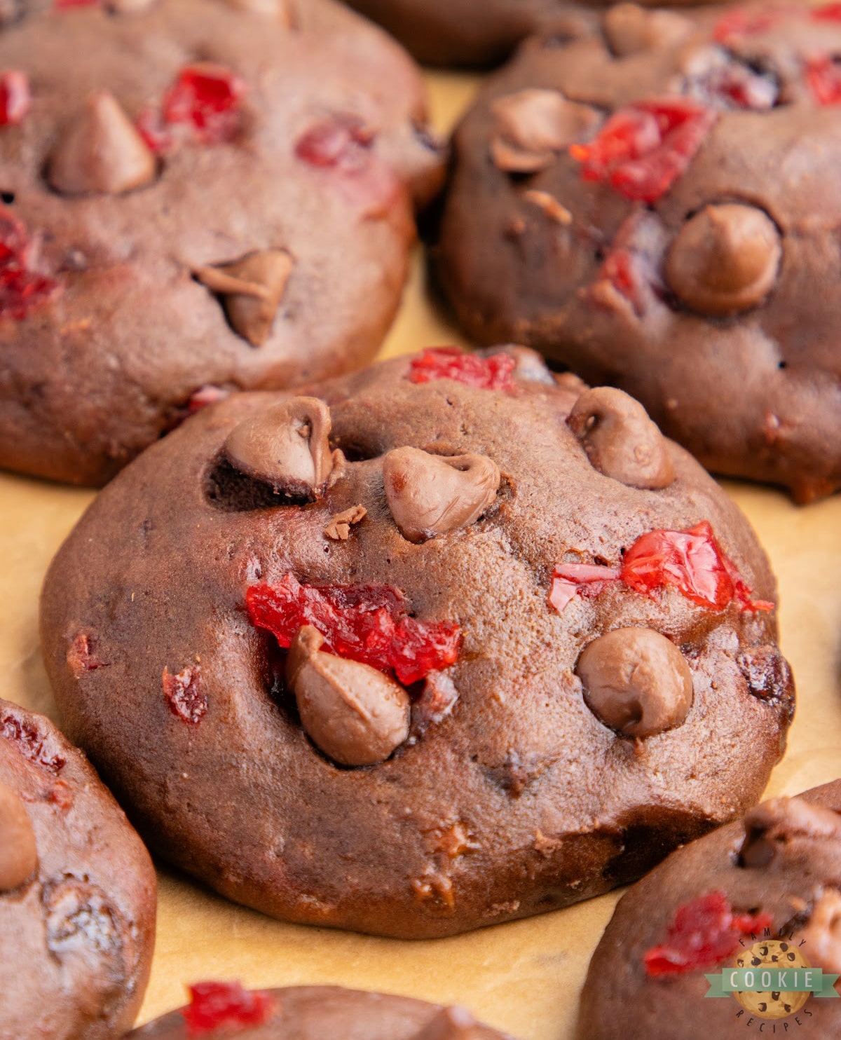 Double Chocolate Banana Split Cookies are made completely from scratch with bananas, chocolate chips, and maraschino cherries. These chewy chocolate cookies taste just like a banana split  - especially if you add a scoop of vanilla ice cream! 