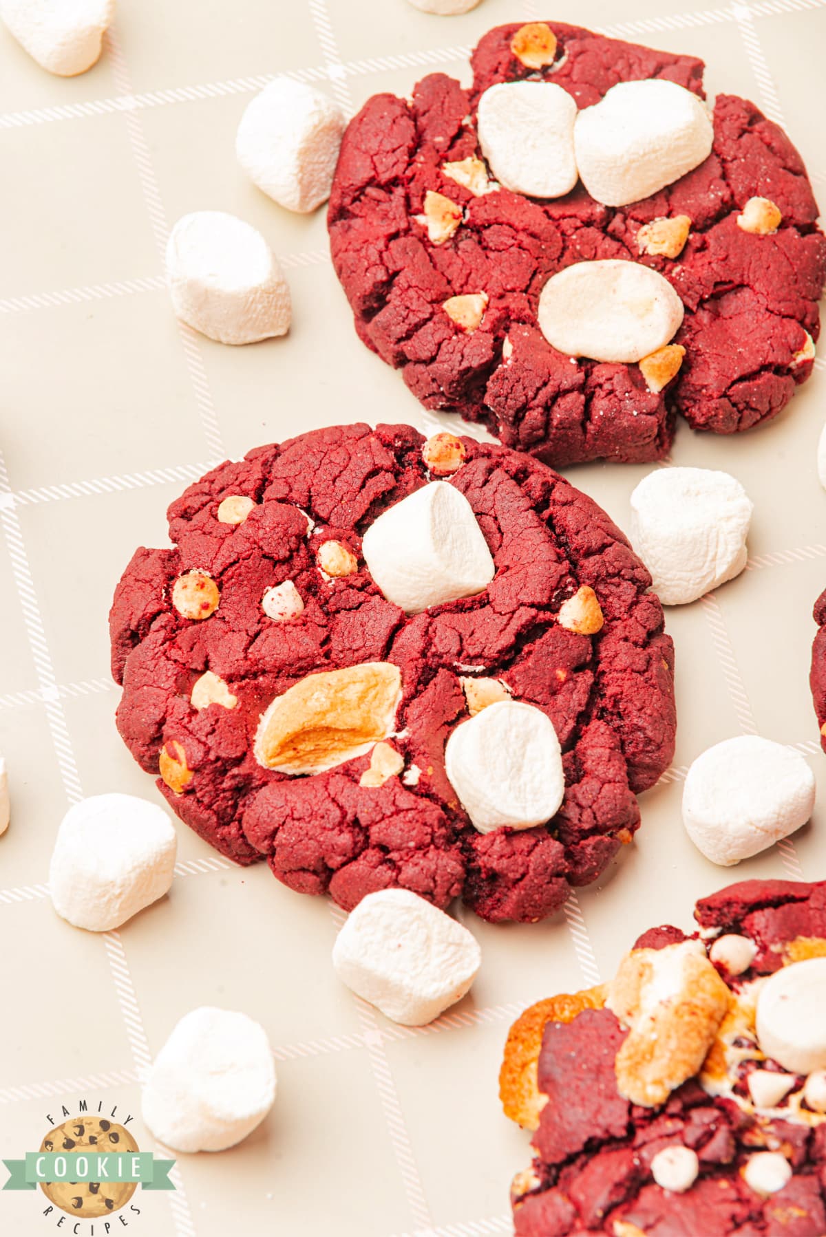 Red Velvet Marshmallow Cookies are made completely from scratch with white chocolate chips and mini marshmallows. These delicious cookies are soft, chewy, and absolutely delicious!