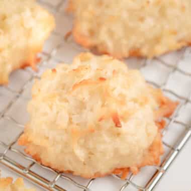 chewy coconut macaroons on a cooling rack