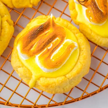 bakery style lemon meringue pie cookies on a cooling rack