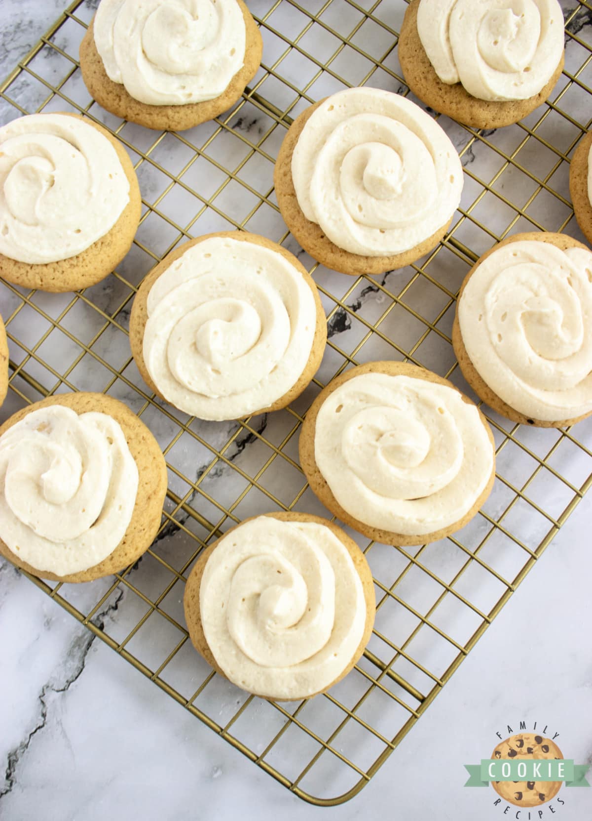 Pipe the frosting onto the cookies once they have cooled completely.