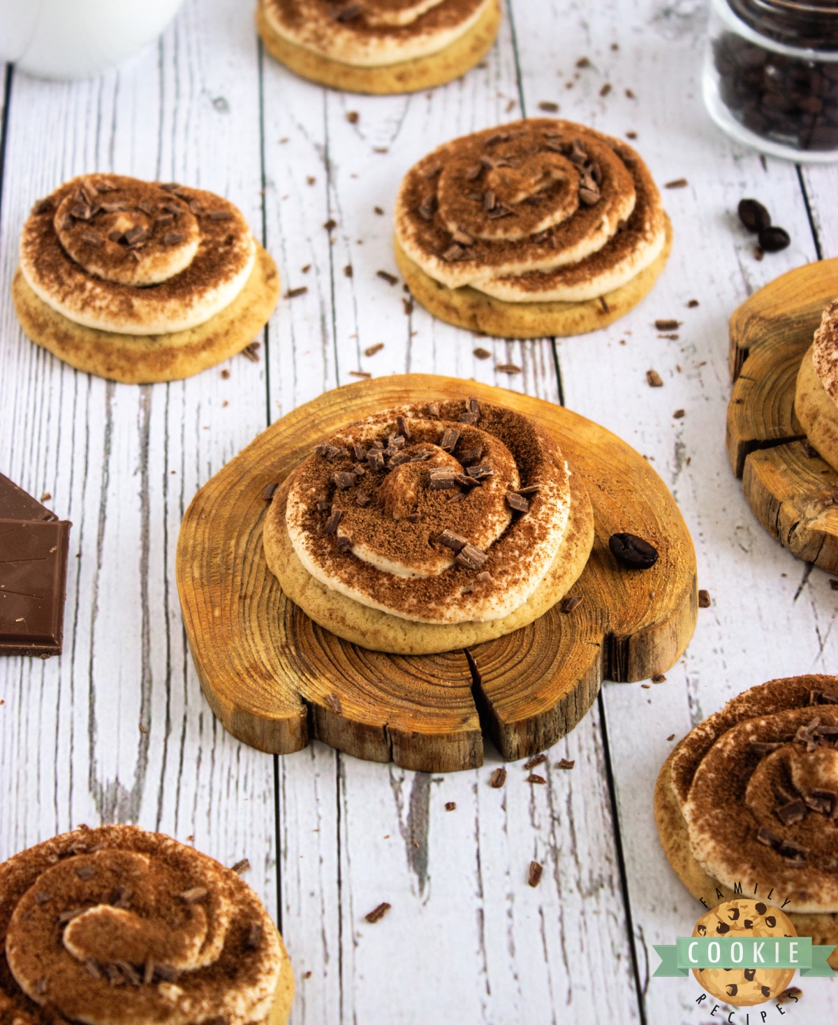 Add a dusting of cocoa powder and grated chocolate on top of the frosted cookies.