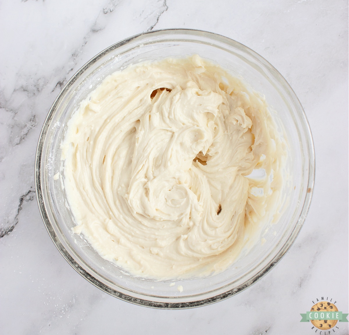 Beat the mascarpone frosting.