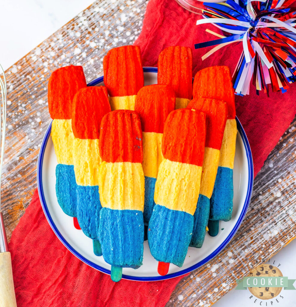 These festive Bomb Pop Cookies are soft, colorful, and packed with classic cherry and berry flavors. Perfect for summer parties and 4th of July!