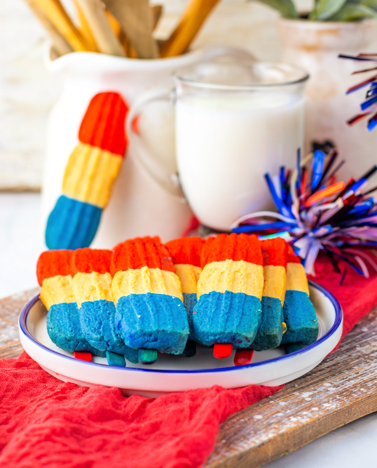 These festive Bomb Pop Cookies are soft, colorful, and packed with classic cherry and berry flavors. Perfect for summer parties and 4th of July!