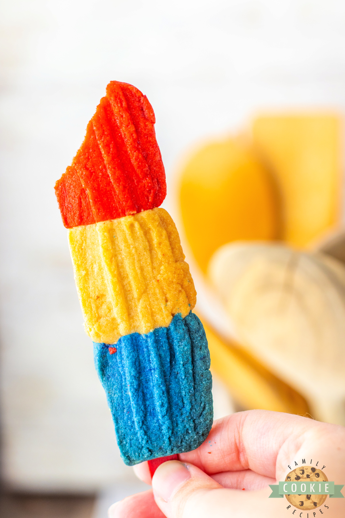 Patriotic cookie on a popsicle stick.