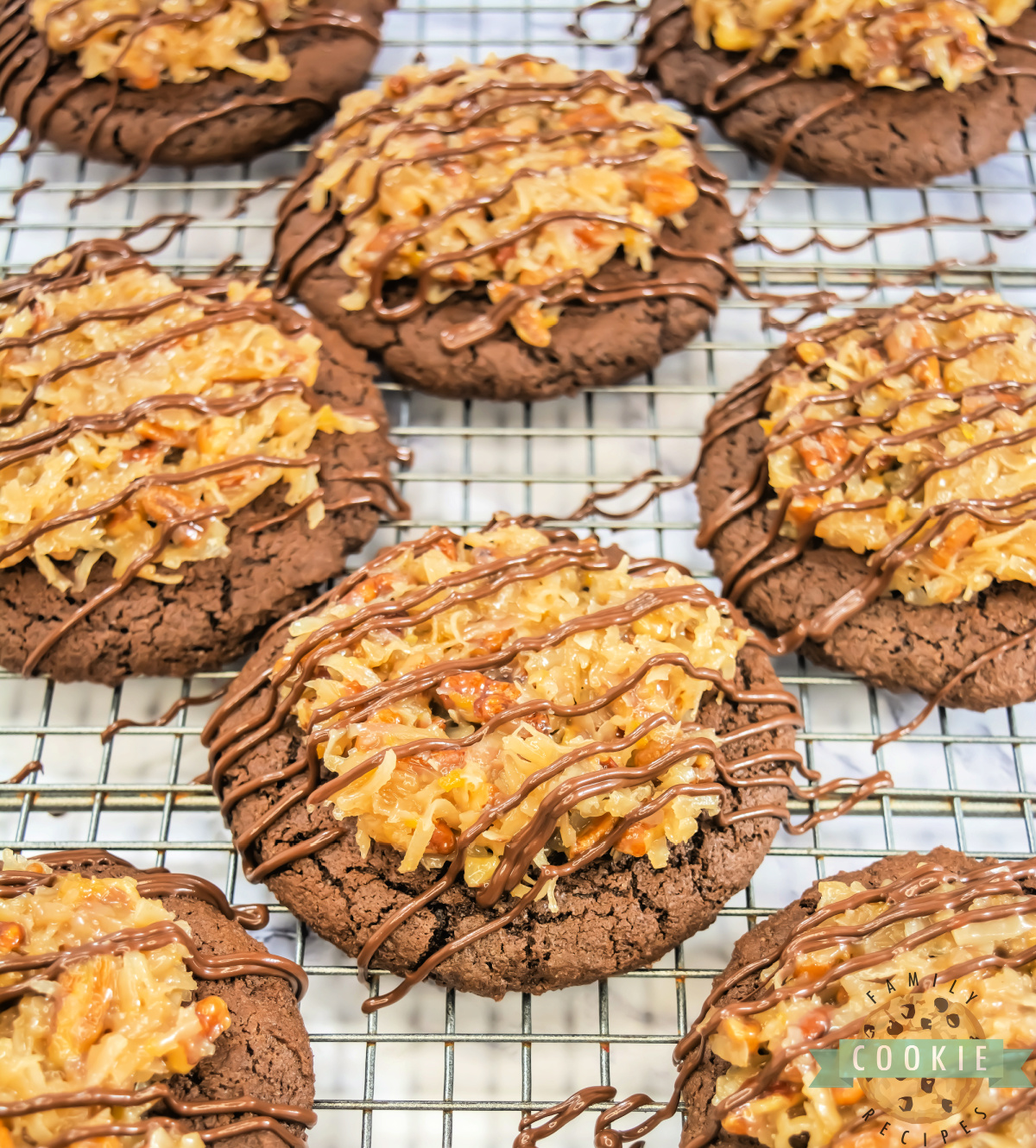 Crumbl Copycat German Chocolate Cake Cookies are rich, soft chocolate cookies topped with gooey coconut pecan frosting and a sweet drizzle.
