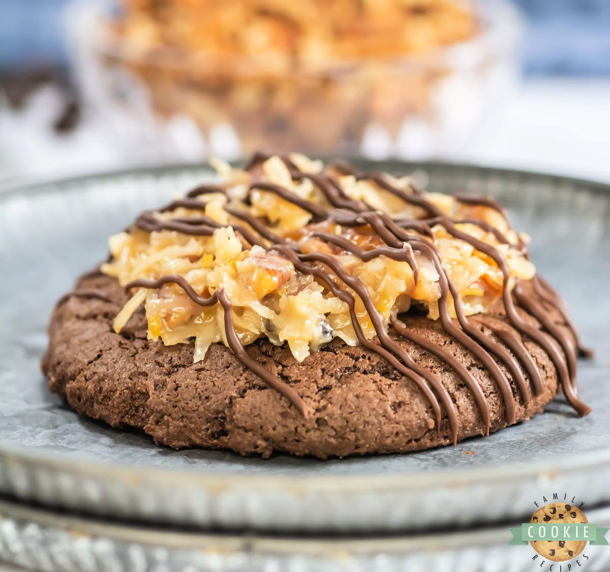 Crumbl Copycat German Chocolate Cake Cookies are rich, soft chocolate cookies topped with gooey coconut pecan frosting and a sweet drizzle.