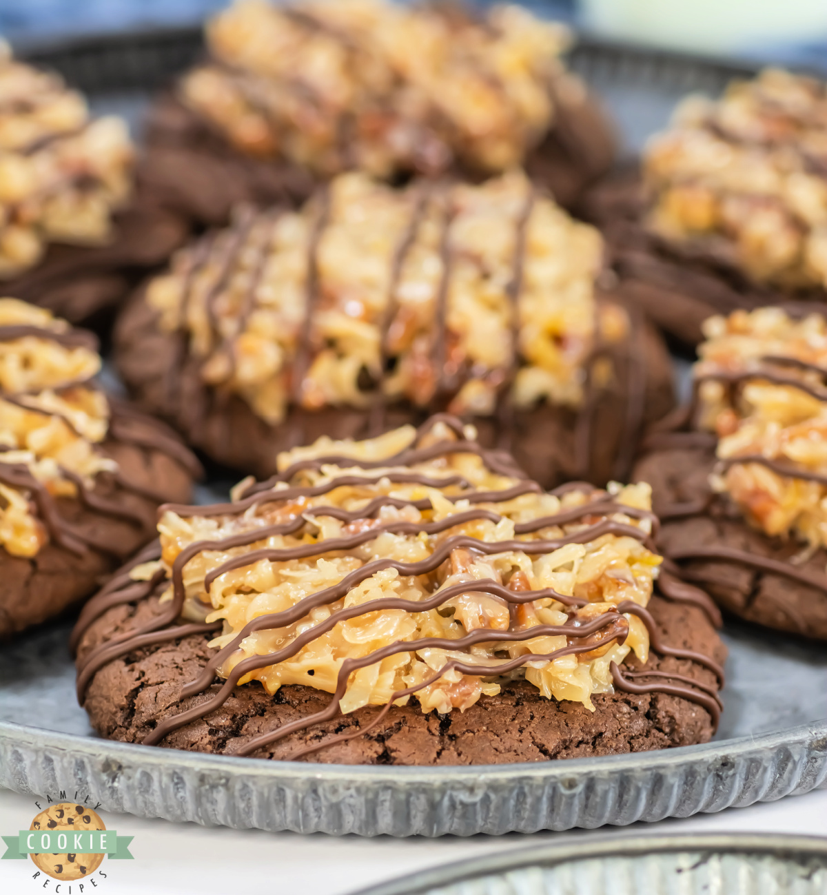 Crumbl Copycat German Chocolate Cake Cookies are rich, soft chocolate cookies topped with gooey coconut pecan frosting and a sweet drizzle.