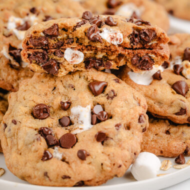 oatmeal marshmallow cookies in a pile with one broken in half