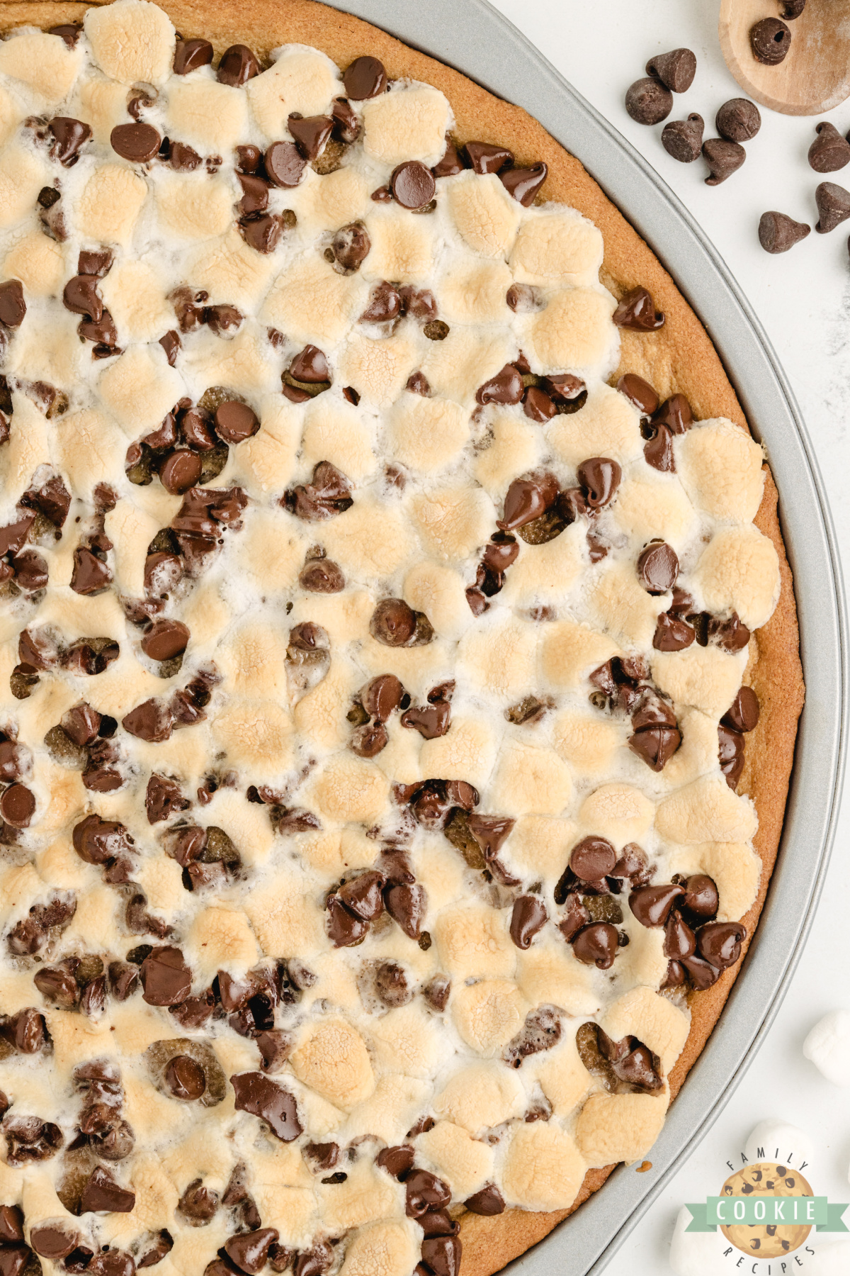 Peanut Butter Cookie Pizza is chewy, gooey, and loaded with marshmallows and chocolate. A fast, fun dessert everyone will love!