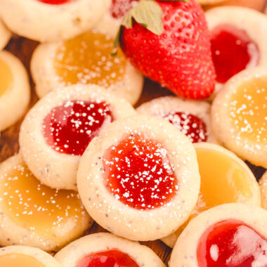 poppy seed thumbprint cookies filled with strawberry jam and lemon curd