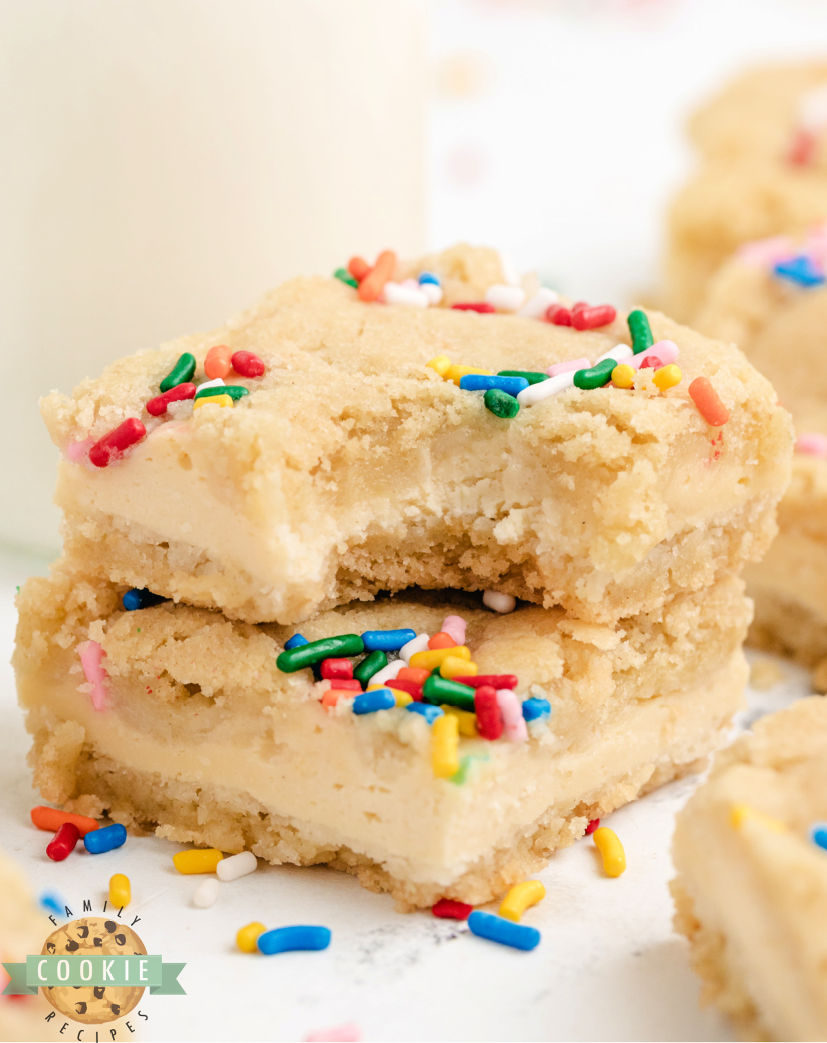 Cheesecake Sugar Cookie Bars are easy to make and delicious to eat! Just 6 ingredients for soft cookie crust and creamy cheesecake center.