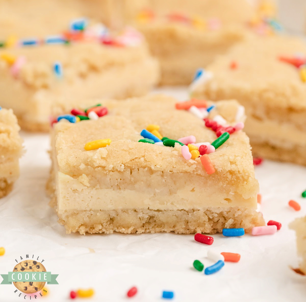 Cheesecake Sugar Cookie Bars are easy to make and delicious to eat! Just 6 ingredients for soft cookie crust and creamy cheesecake center.