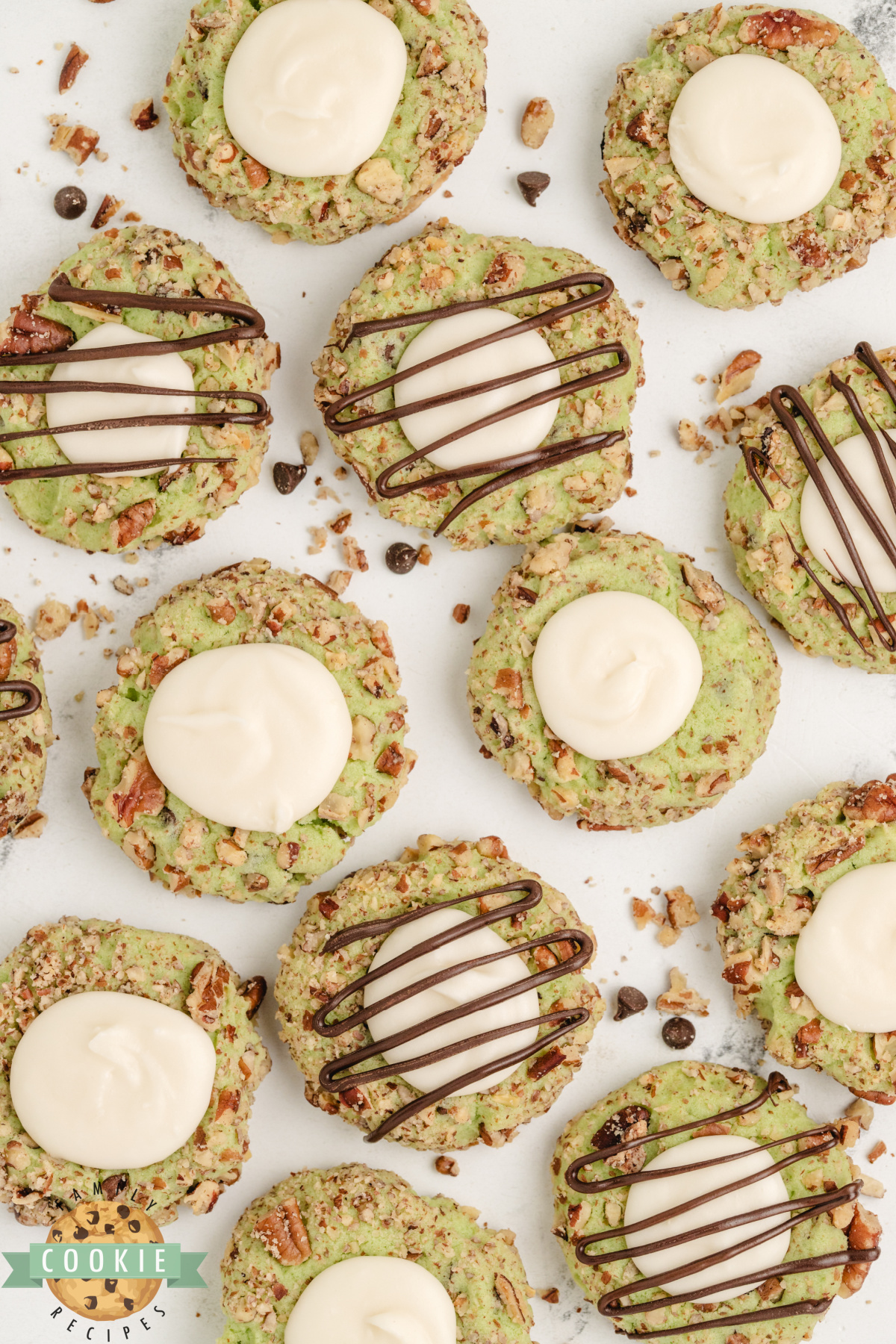Pistachio thumbprint cookies with a creamy buttercream filling.