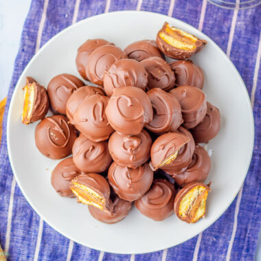easy 3 ingredient Twix Cookie Bites on a white plate