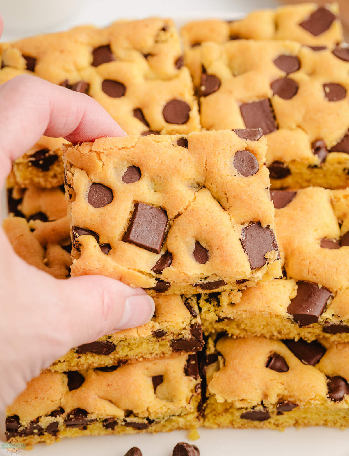picking up a cookie bar