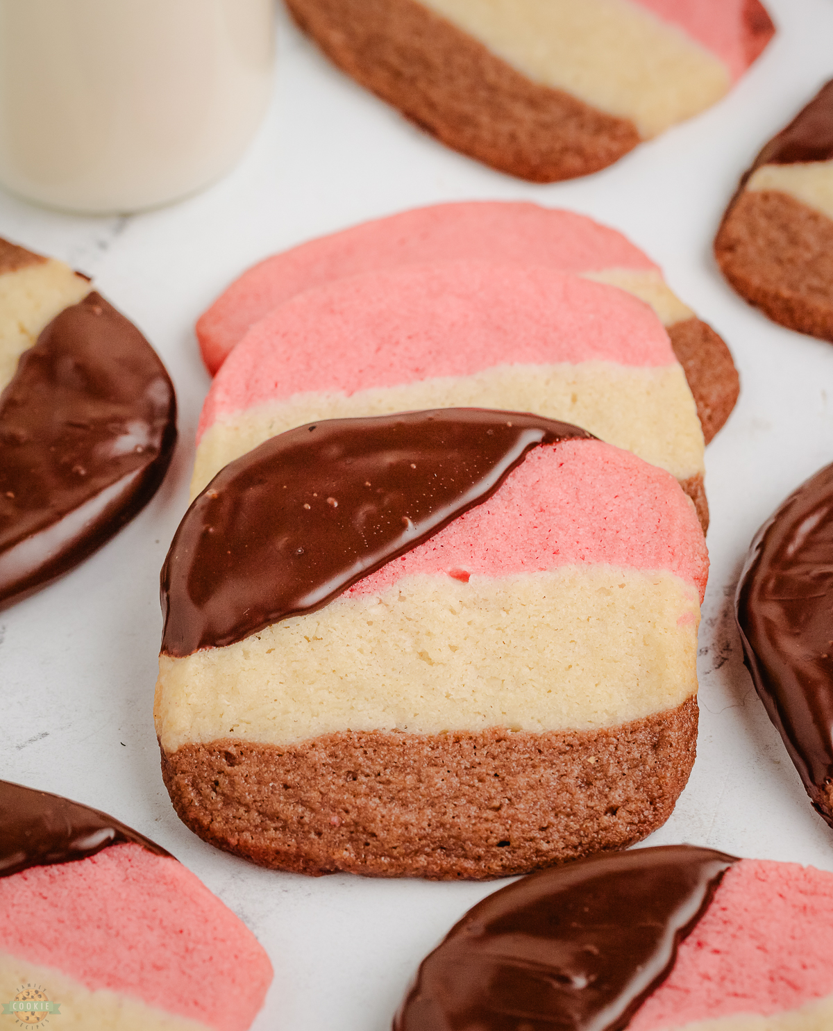 neapolitan cookies with 3 layers dipped in chocolate