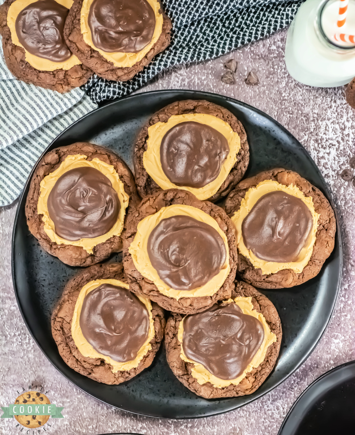 Copycat Crumbl Buckeye Brownie Cookies have a fudgy chocolate base, peanut butter frosting, and ganache topping.