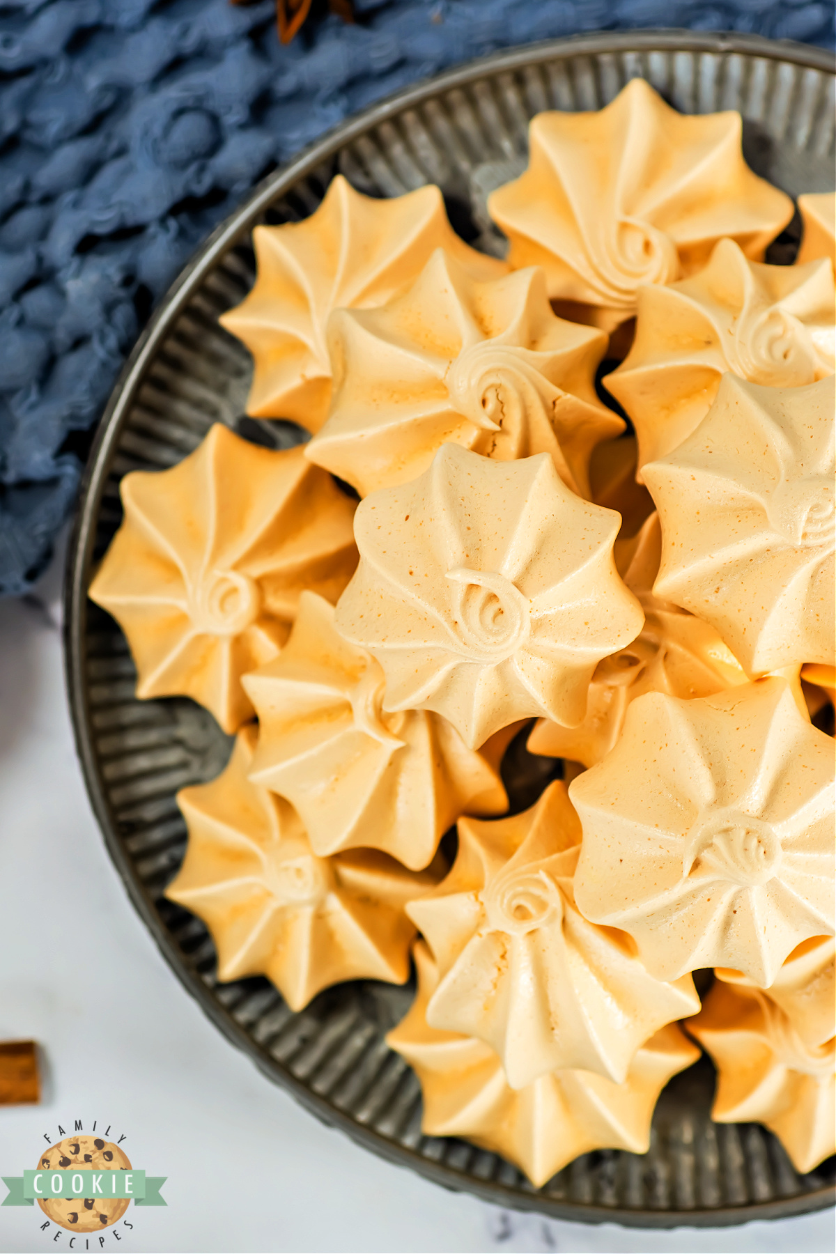 Pumpkin Meringues are light, crisp cookies flavored with pumpkin and tinted orange— easy, festive, and perfect for fall dessert trays!
