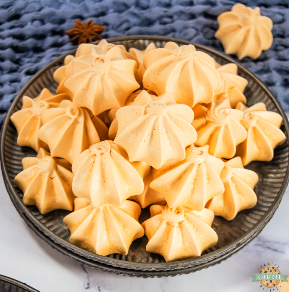 Pumpkin Meringues are light, crisp cookies flavored with pumpkin and tinted orange— easy, festive, and perfect for fall dessert trays!