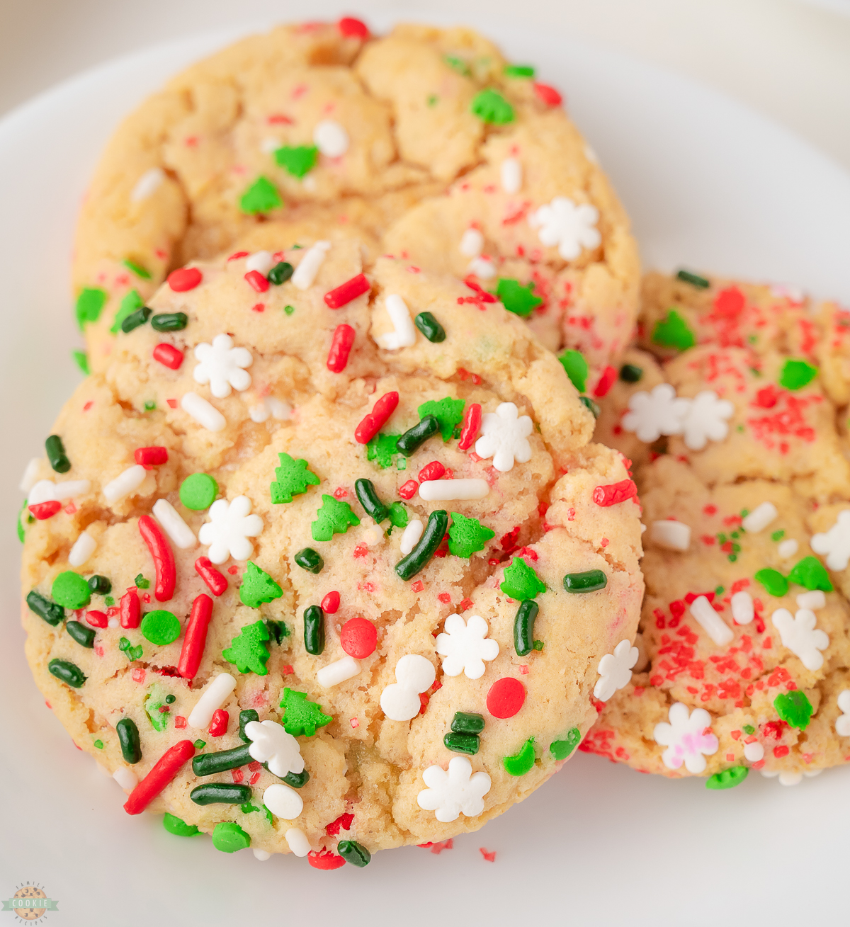 Christmas Sprinkle cookies on a white plate