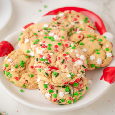Santa plate filled with Christmas Sprinkle cookies