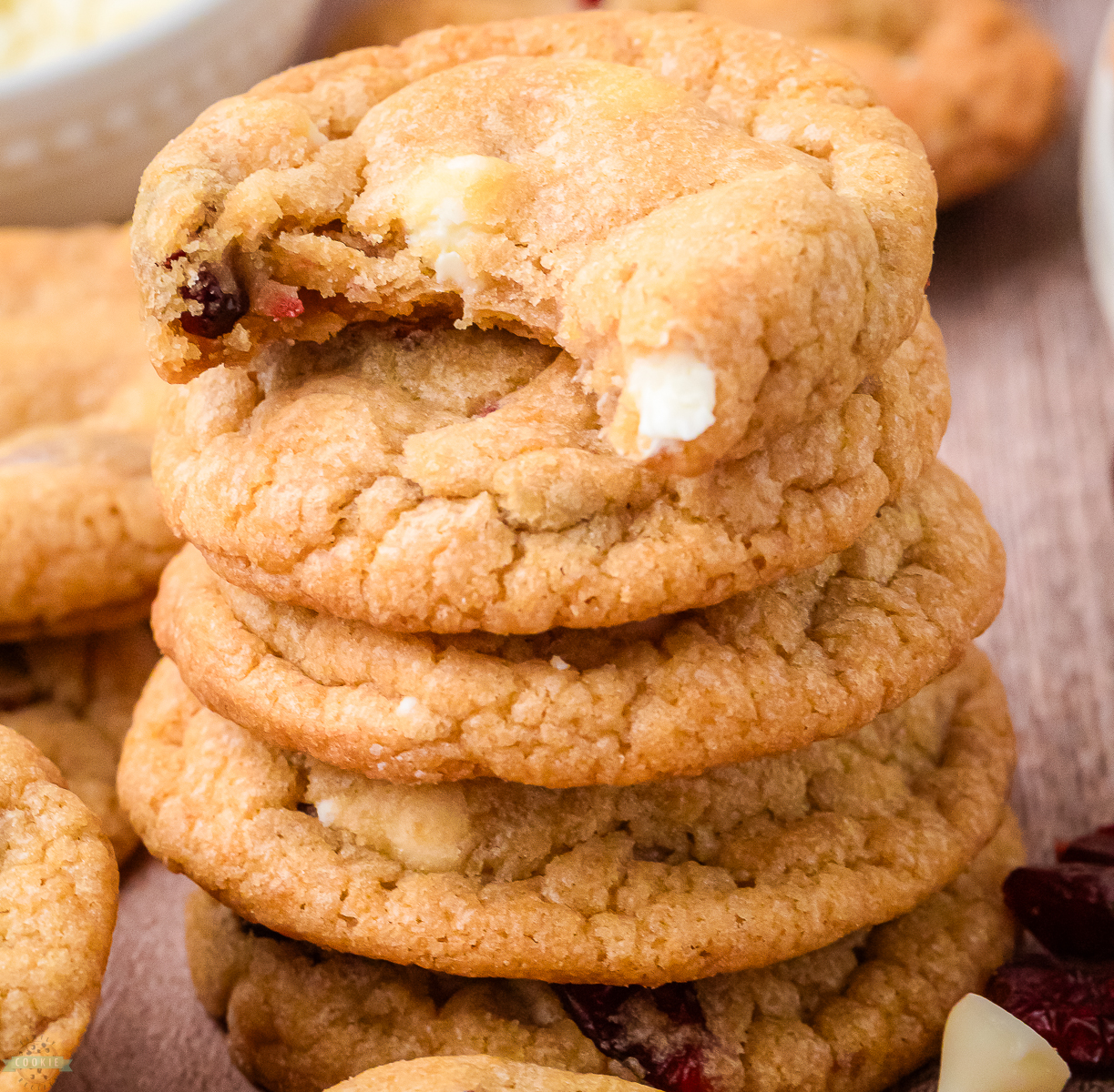 stack of buttery white chocolate cookies with cranberries