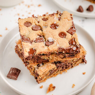 two Nestle Toll House Cookie Bars stacked on a plate