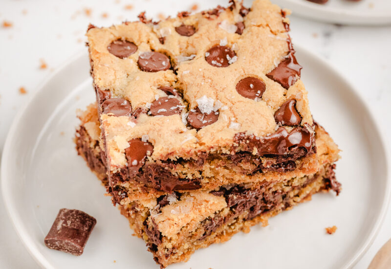 two Nestle Toll House Cookie Bars stacked on a plate